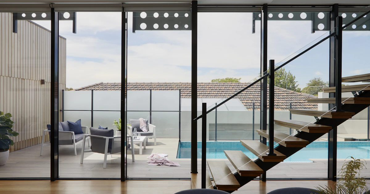 Modern home exterior with clean lines and desert landscaping