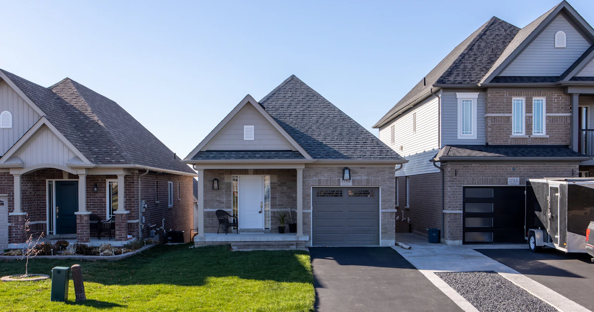 Beautiful home exterior with stone accents and landscaped garden
